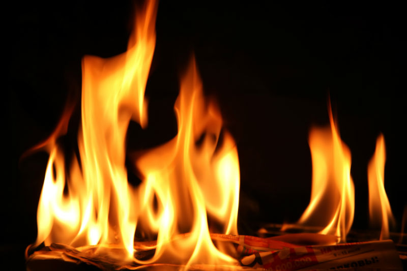 close up of fire flames with black background