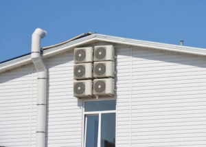 white house with air and dryer vent ducts