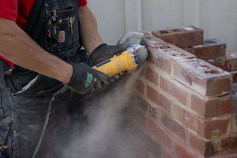 Lords Chimney- Original image masonry work Technician repairing masonry
